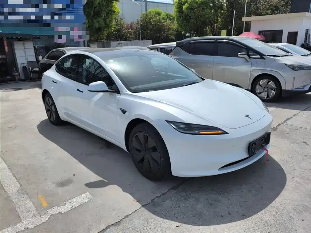 Tesla Model 3 — фото 9