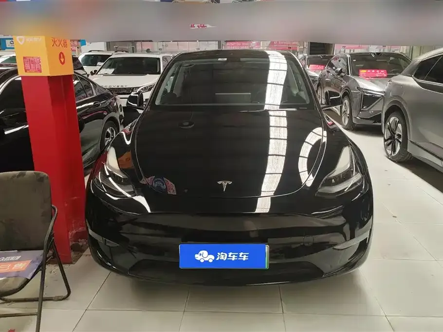 Tesla Model Y — фото 10