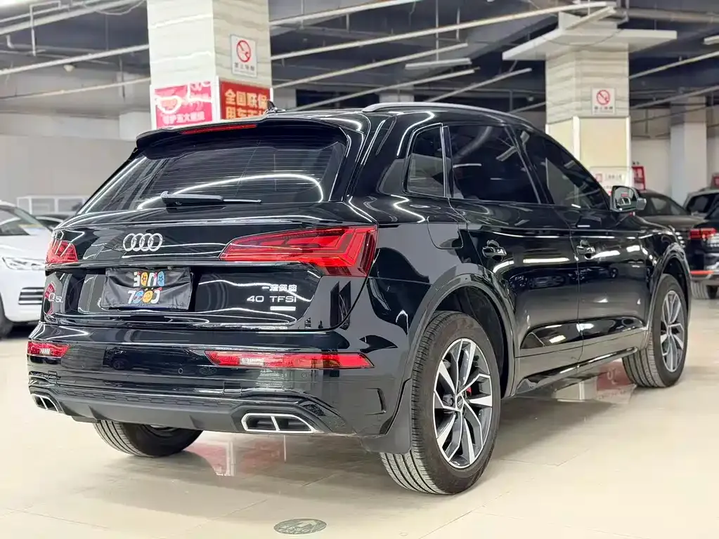 Audi Q5L — фото 6