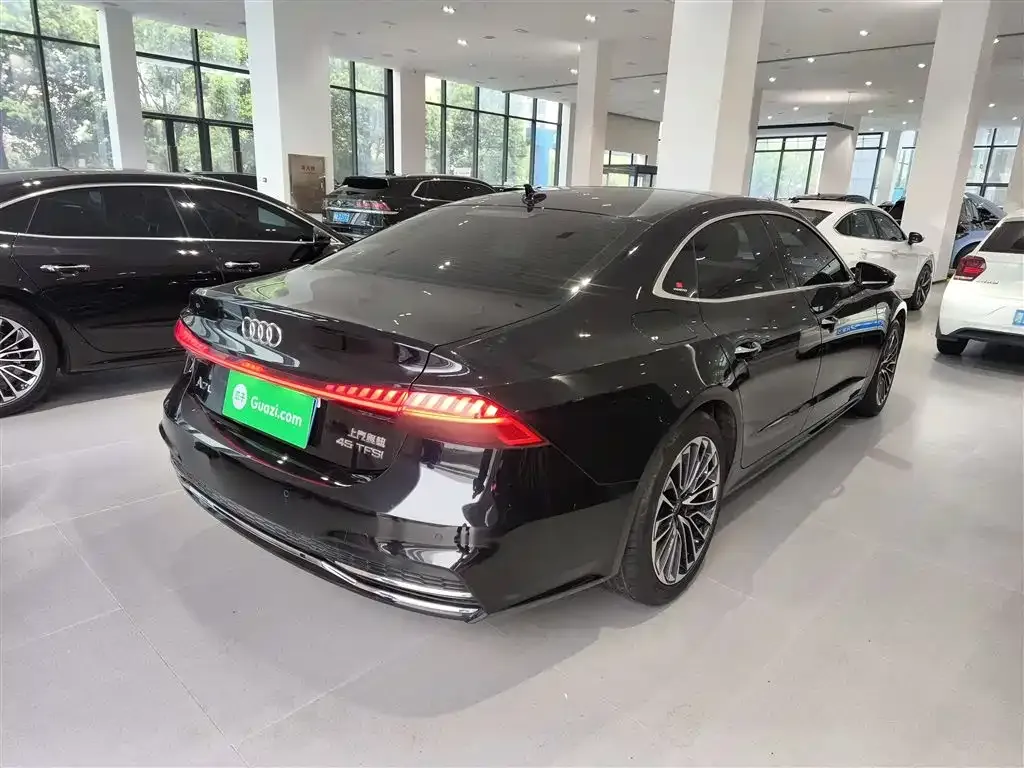 Audi A7L — фото 10