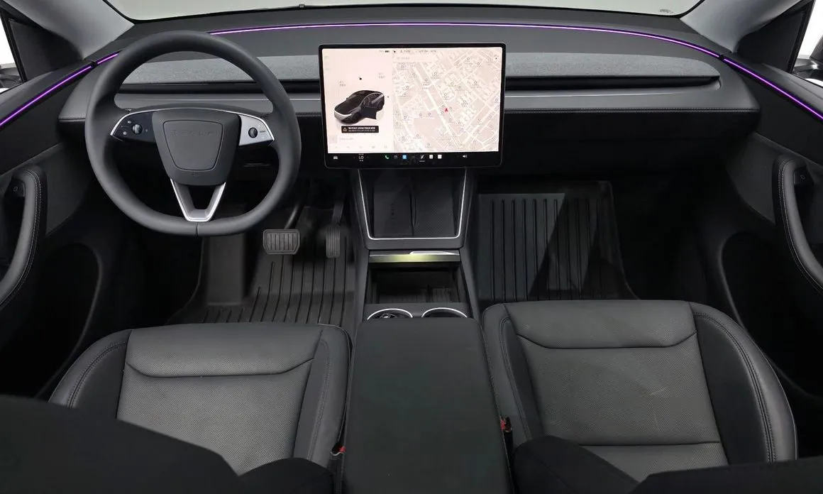 Tesla Model Y — фото 10