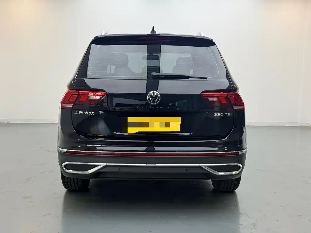 Volkswagen Tiguan L — фото 2