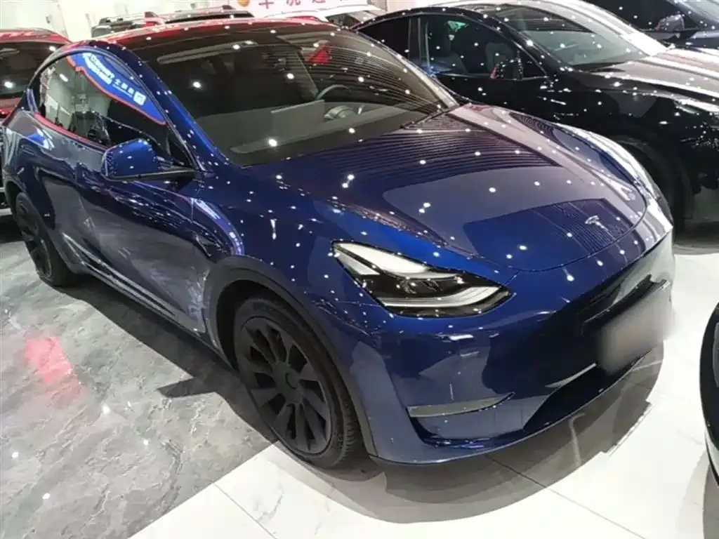 Tesla Model Y — фото 10