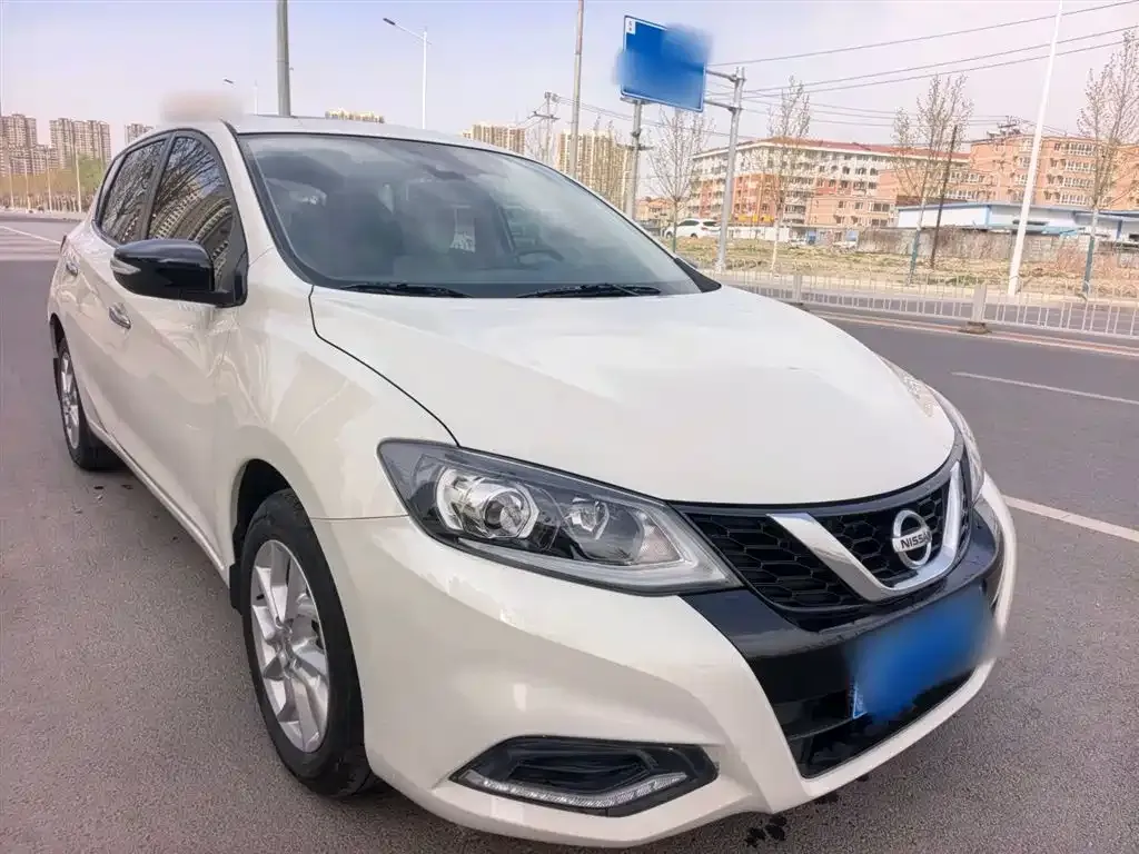 Nissan Tiida — фото 9