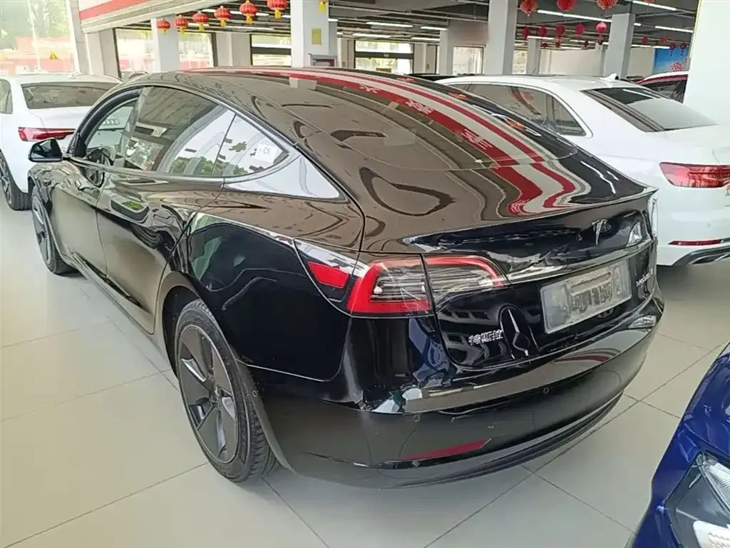 Tesla Model 3 — фото 10