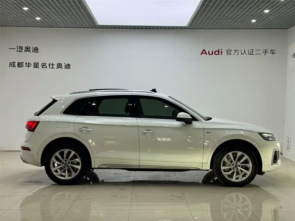 Audi Q5L — фото 6