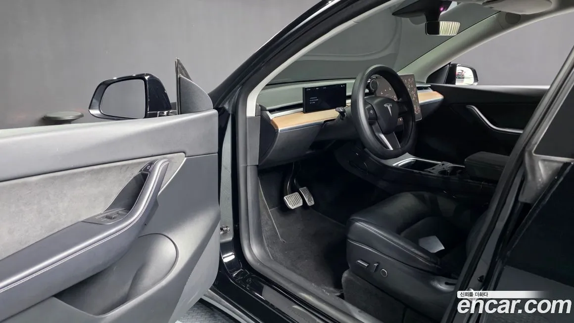 Tesla Model Y — фото 7