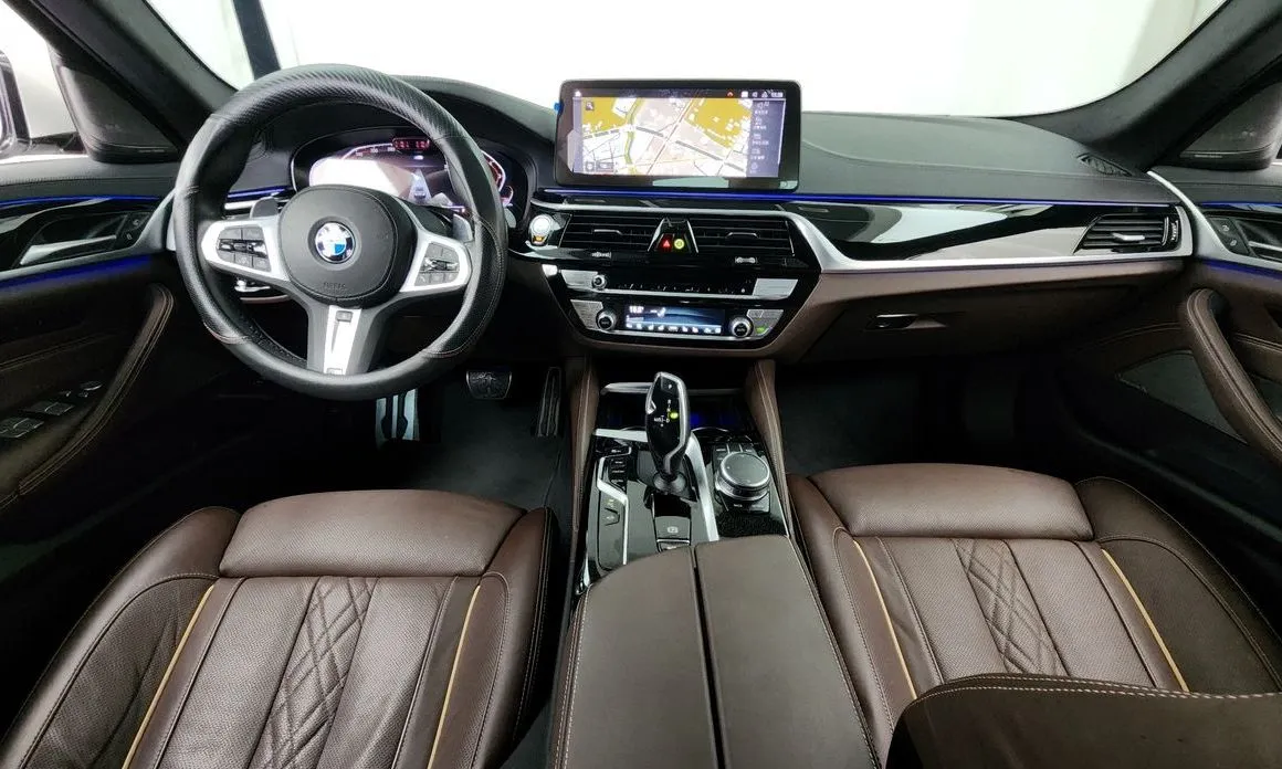 BMW 5-Series — фото 10