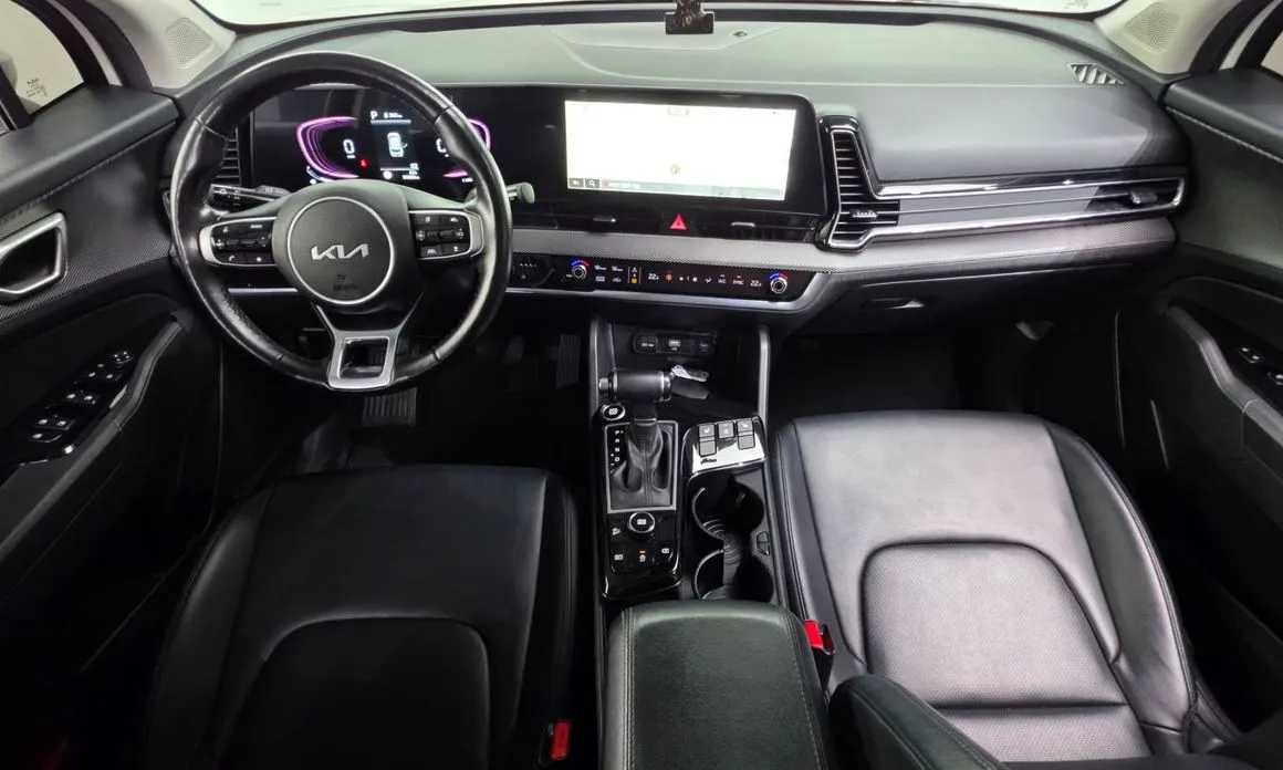 Kia Sportage — фото 9