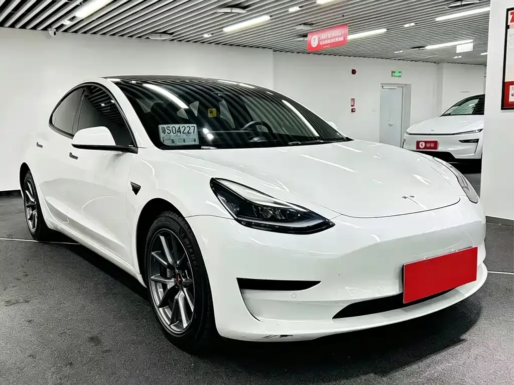 Tesla Model 3 — фото 6