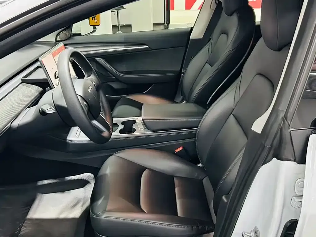 Tesla Model 3 — фото 4