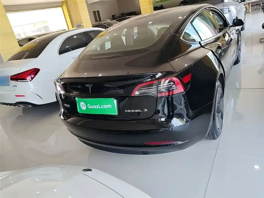 Tesla Model 3 — фото 7