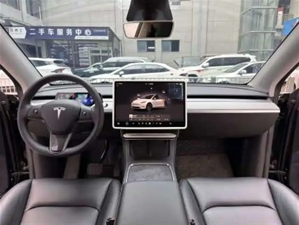 Tesla Model Y — фото 10