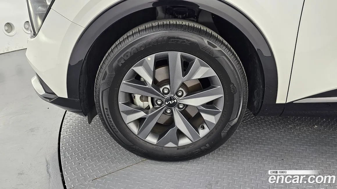 Kia Sportage — фото 10