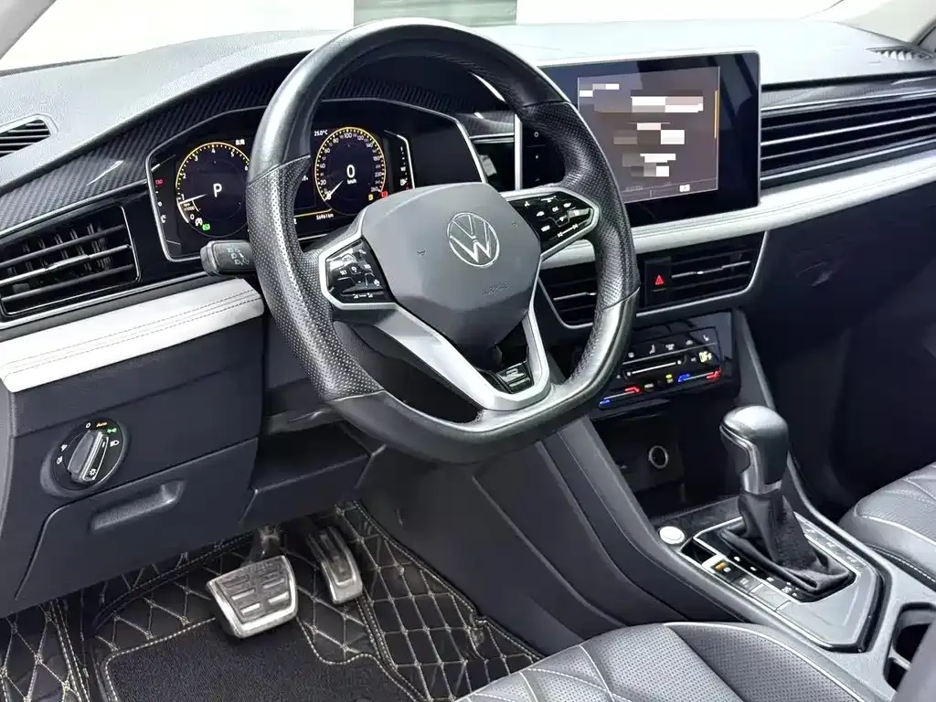 Volkswagen Tiguan L — фото 8
