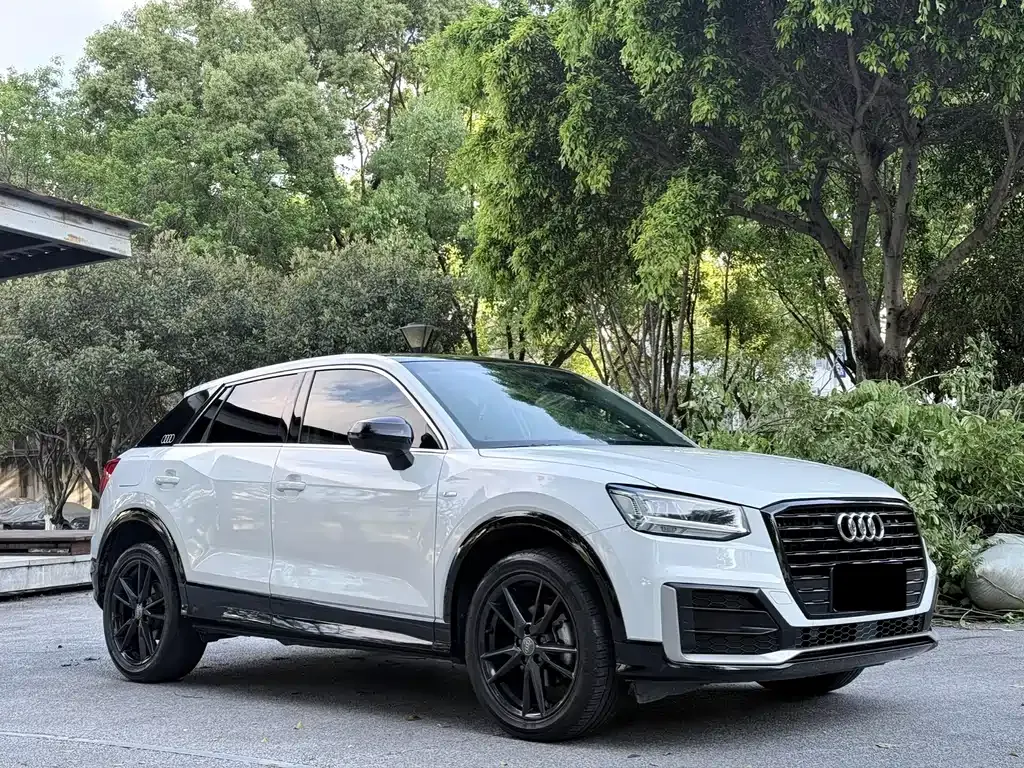 Audi Q2L — фото 10