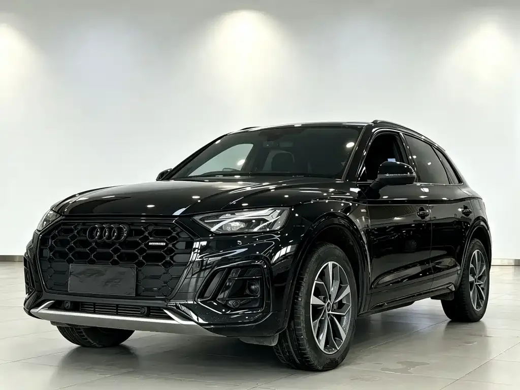 Audi Q5L — фото 9