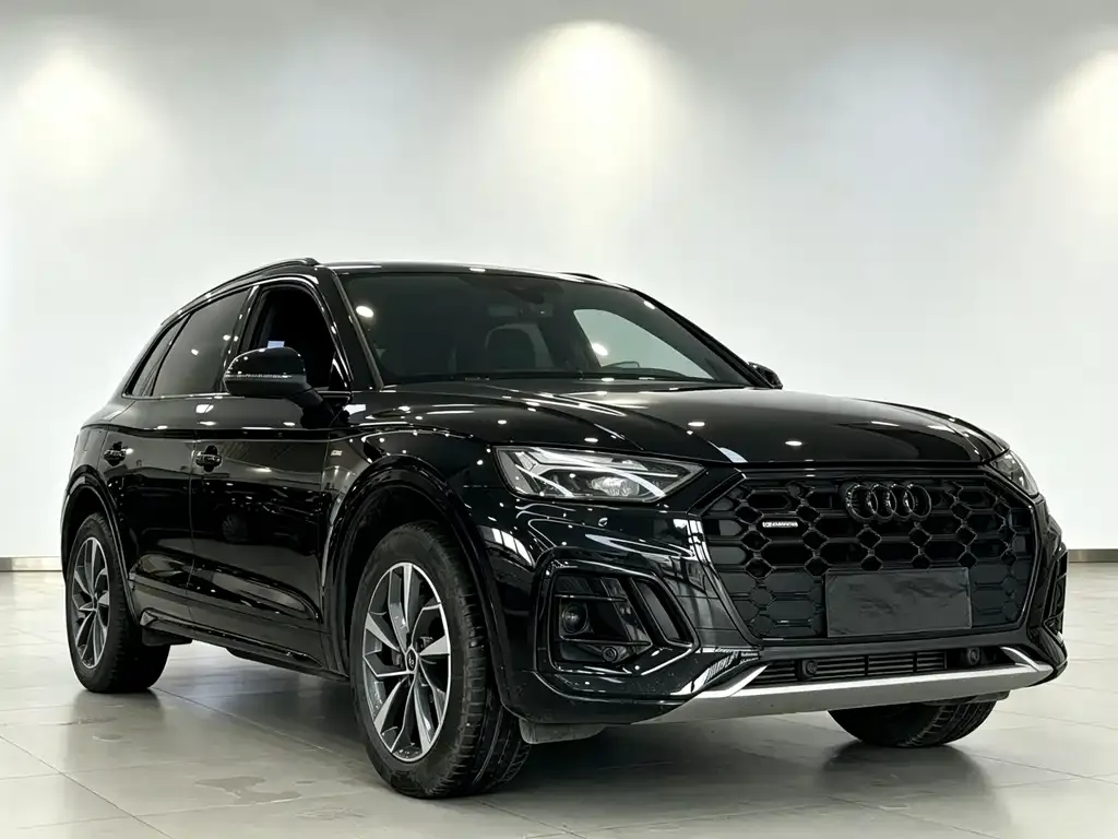 Audi Q5L — фото 5