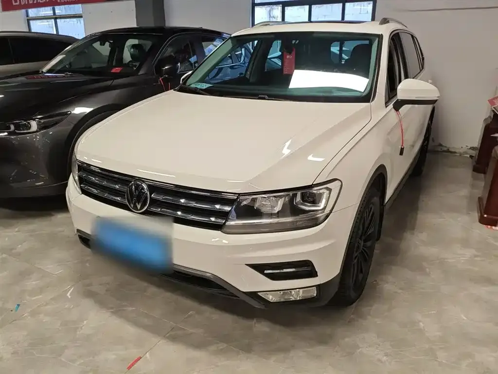 Volkswagen Tiguan L — фото 3