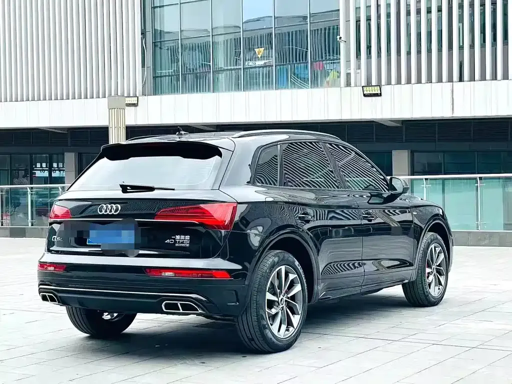 Audi Q5L — фото 7