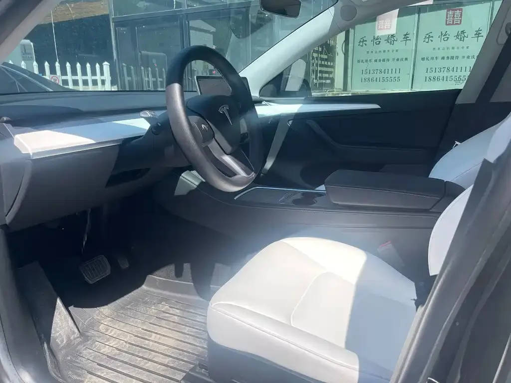 Tesla Model Y — фото 7