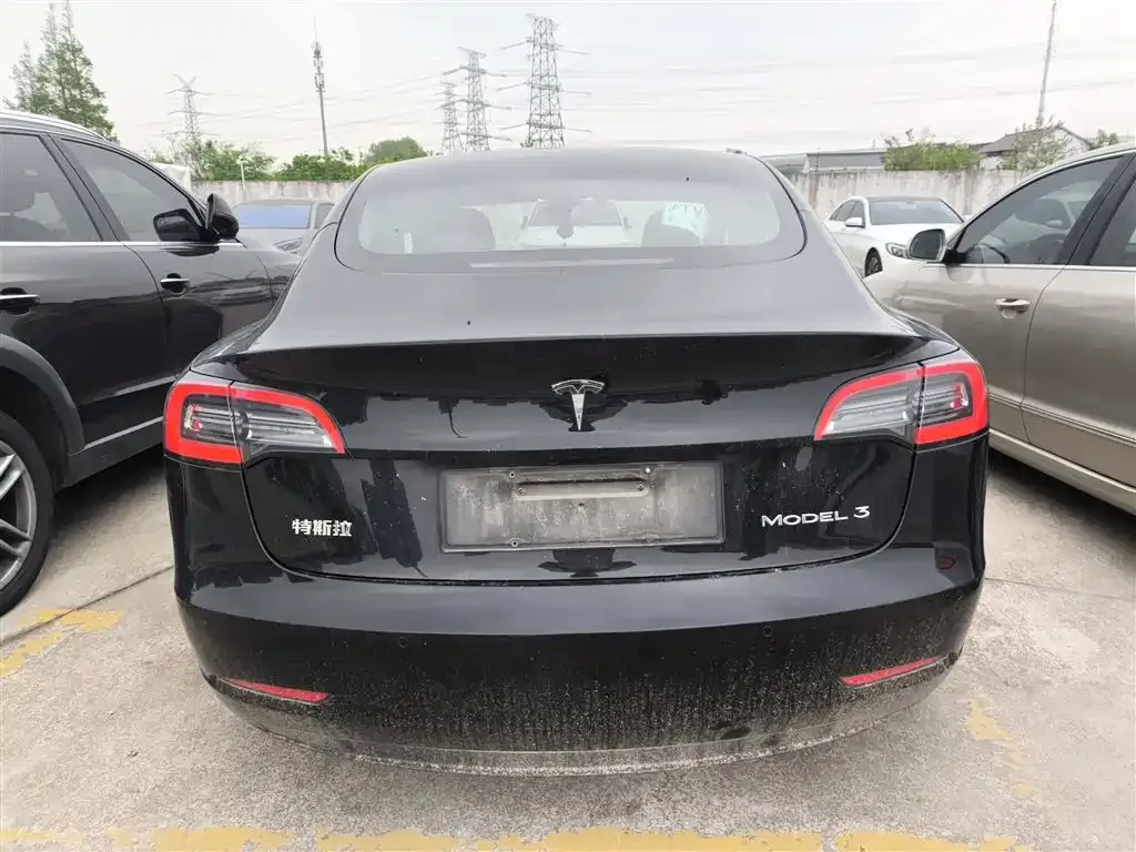 Tesla Model 3 — фото 7