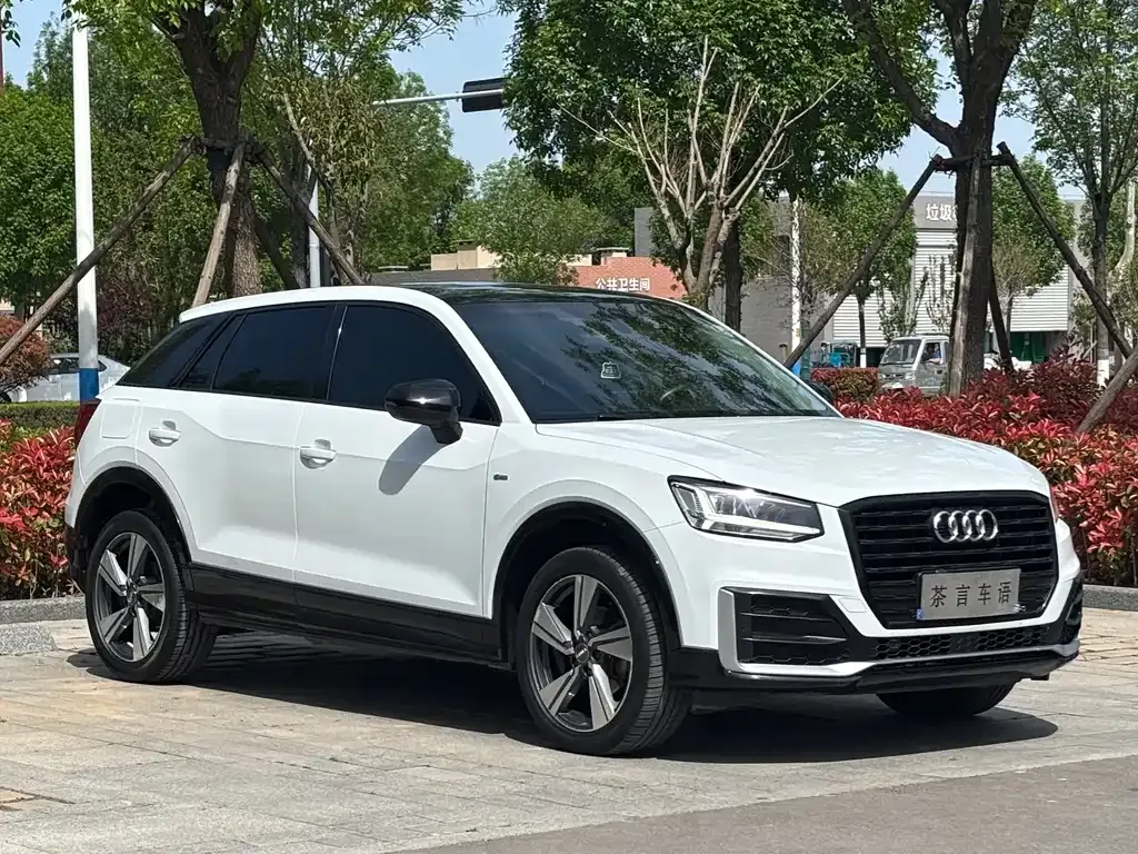Audi Q2L — фото 9