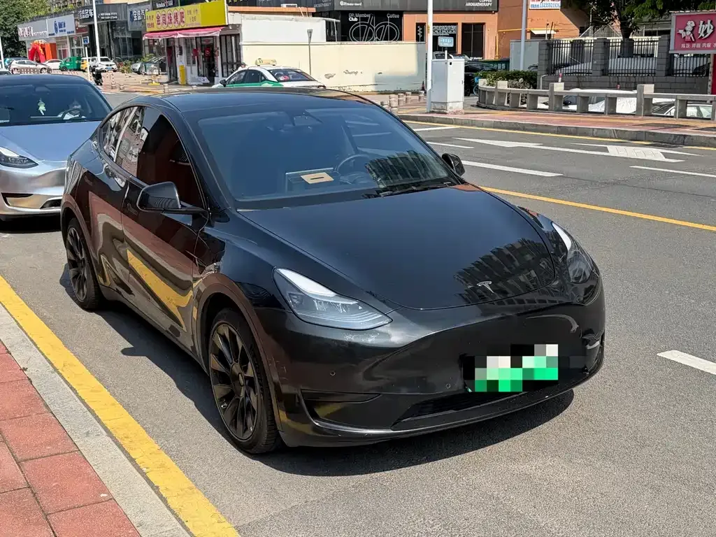 Tesla Model Y — фото 7