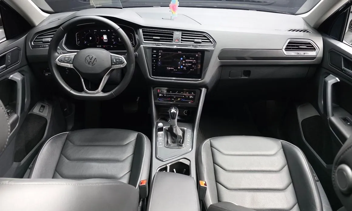 Volkswagen Tiguan — фото 8