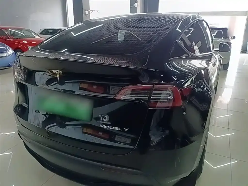 Tesla Model Y — фото 6
