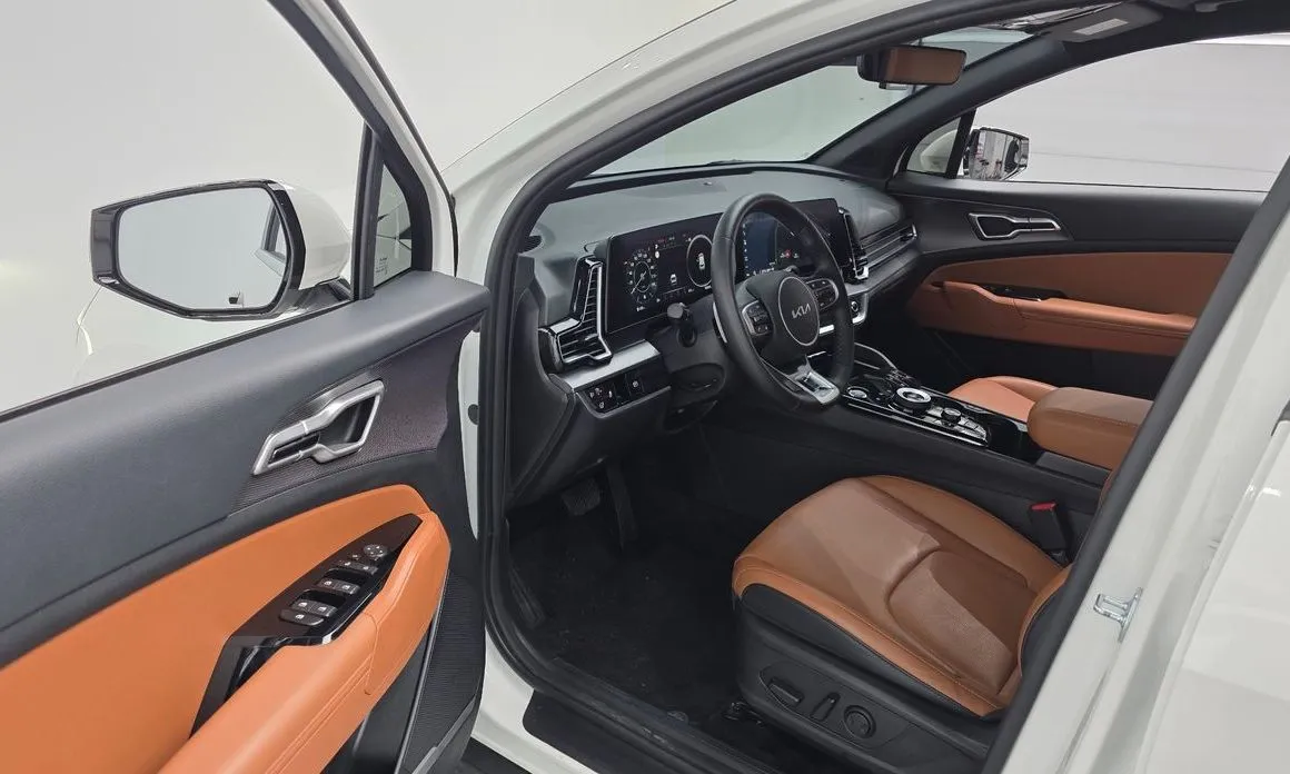 Kia Sportage — фото 10