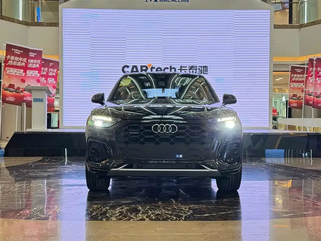 Audi Q5L — фото 5