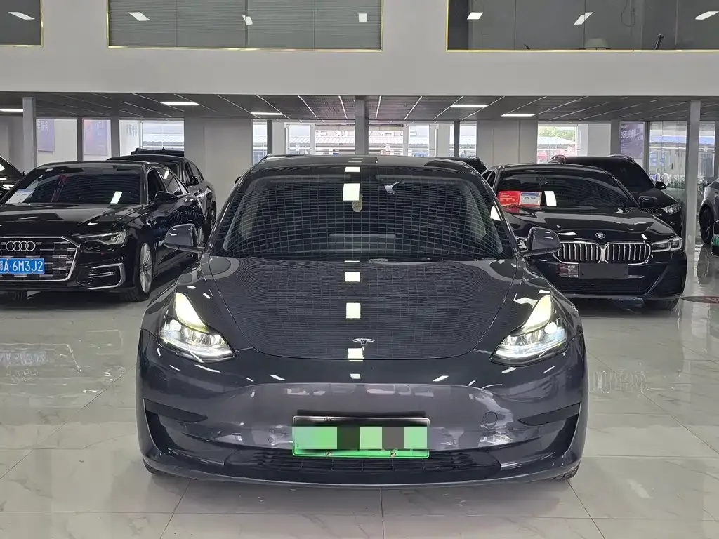 Tesla Model 3 — фото 7