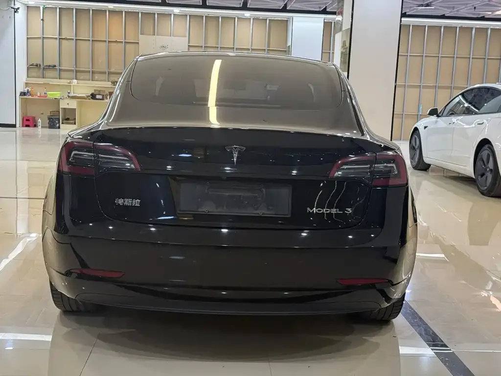 Tesla Model 3 — фото 6