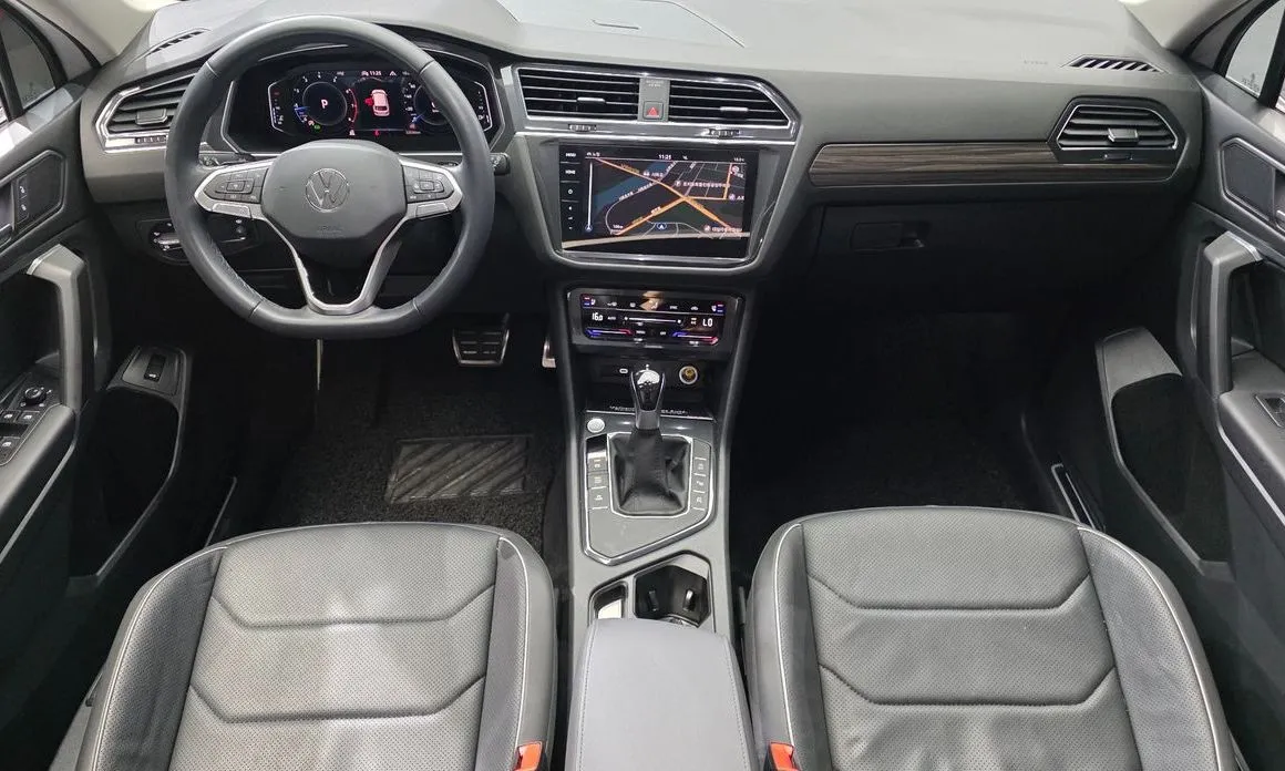 Volkswagen Tiguan — фото 9