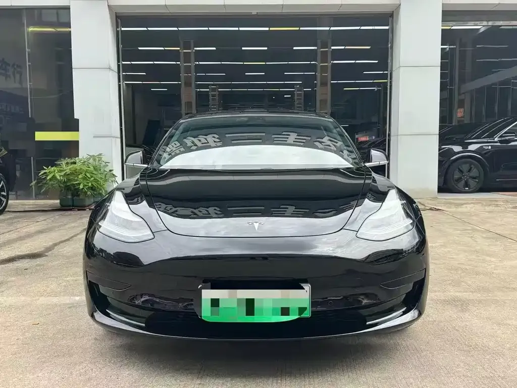 Tesla Model 3 — фото 7