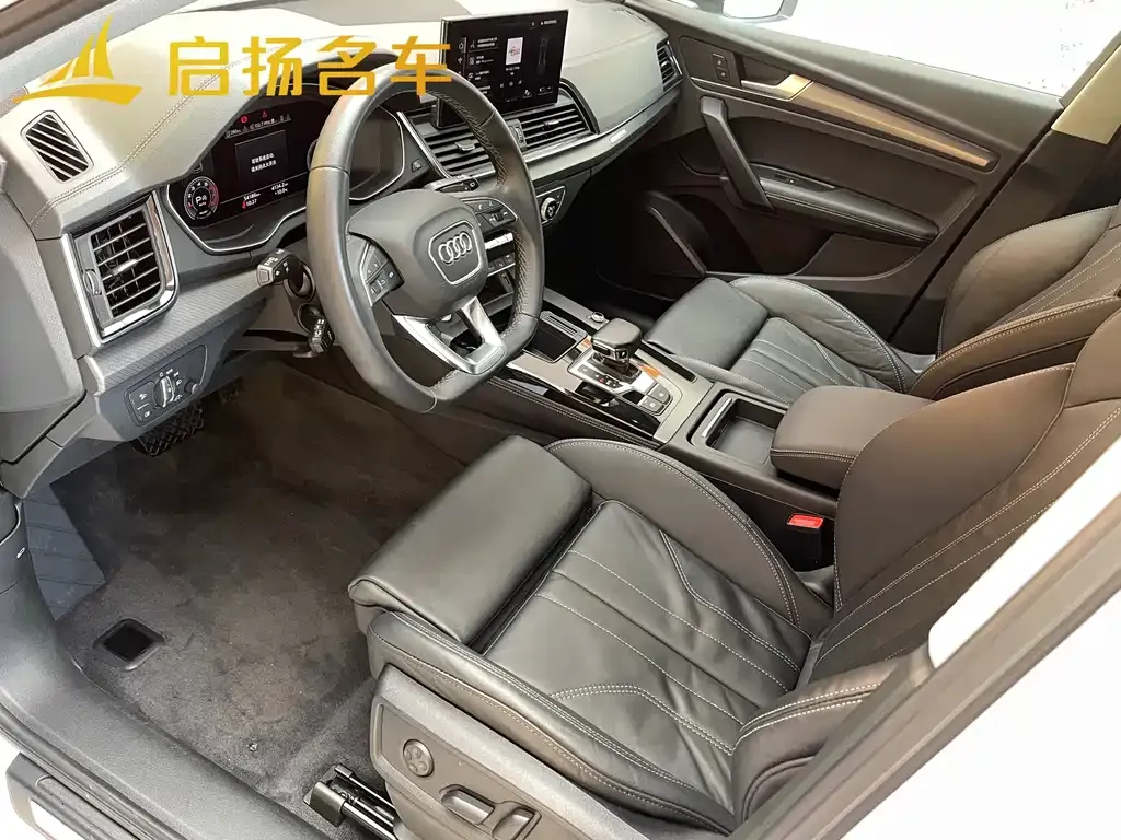 Audi Q5L — фото 8