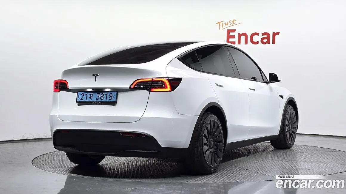 Tesla Model Y — фото 7