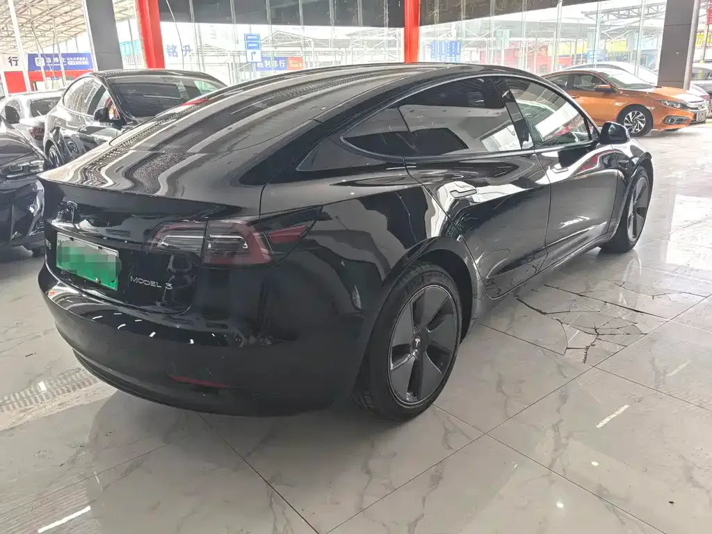 Tesla Model 3 — фото 5
