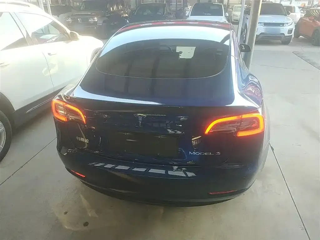 Tesla Model 3 — фото 10