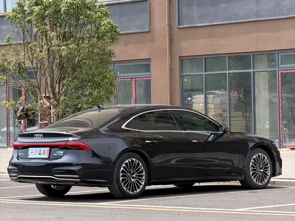 Audi A7L — фото 8