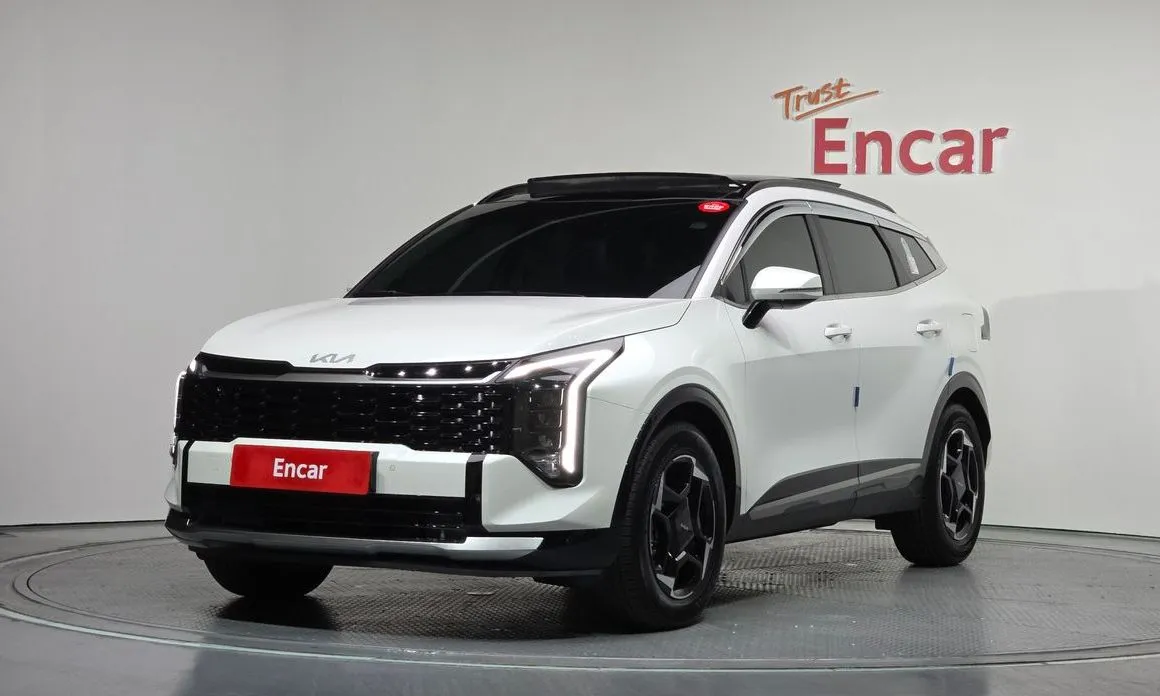 Kia Sportage — фото 1