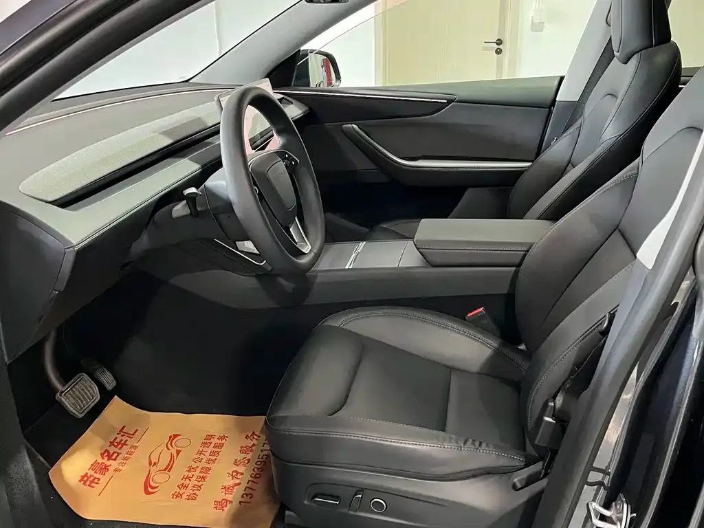 Tesla Model Y — фото 9