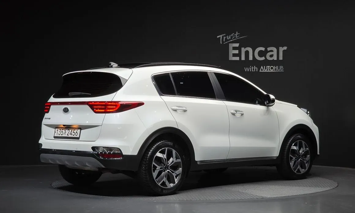 Kia Sportage — фото 7