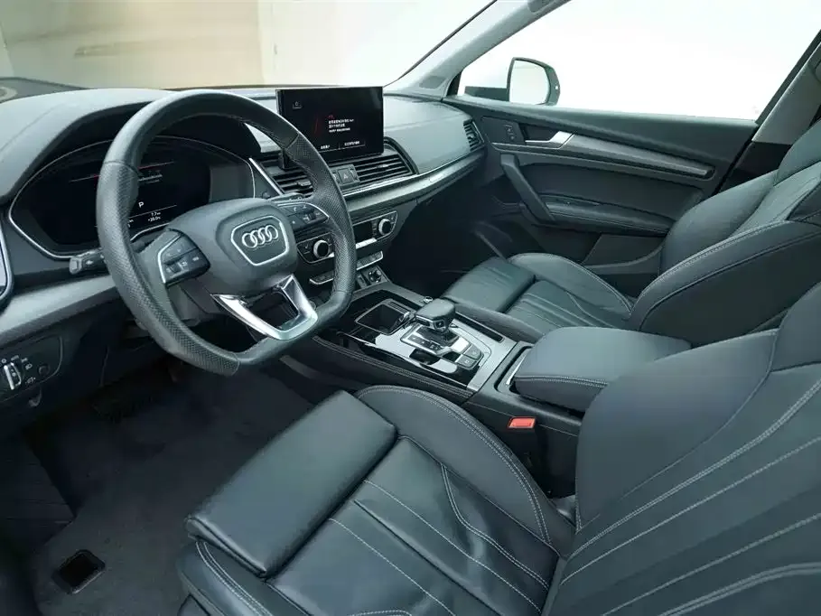 Audi Q5L — фото 10