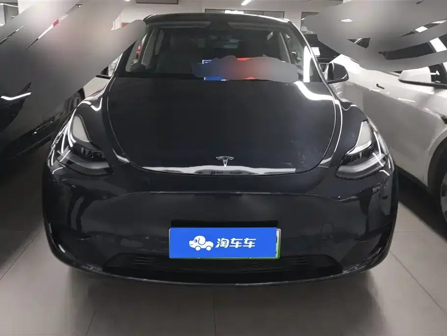 Tesla Model Y — фото 9
