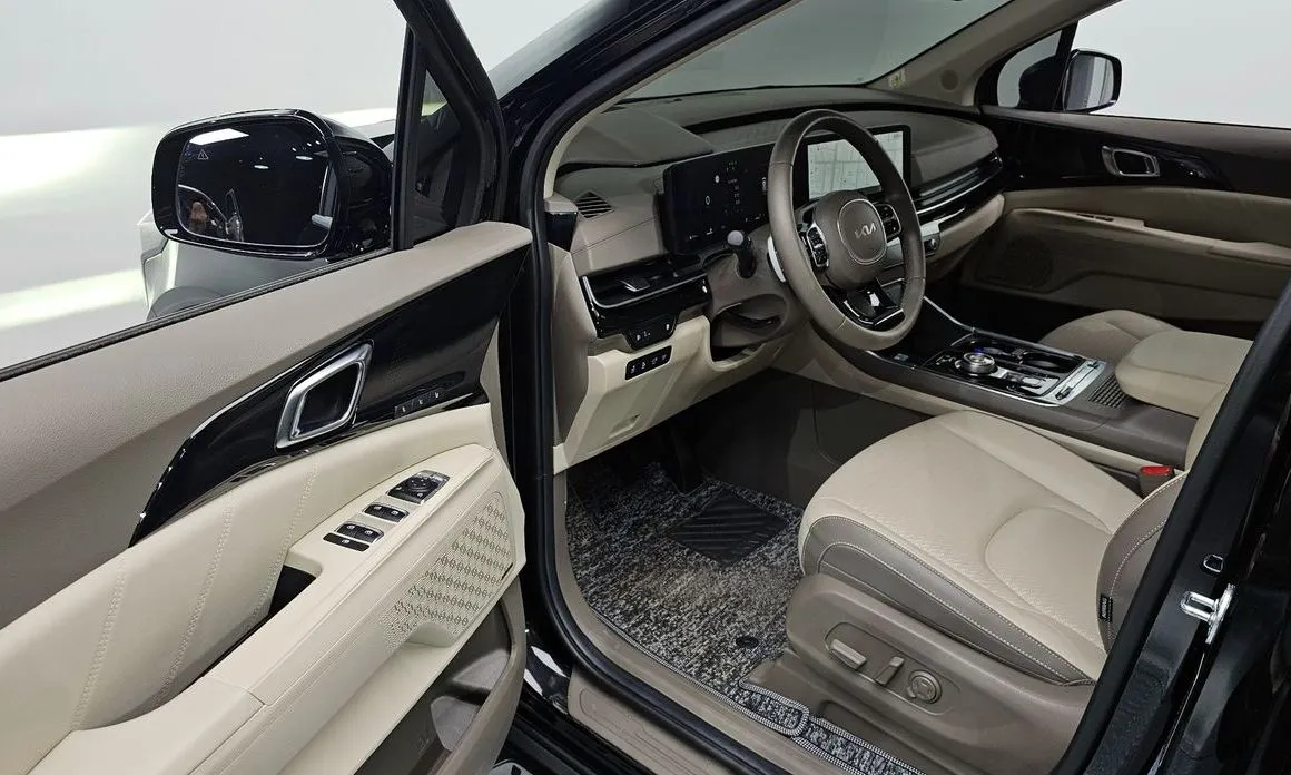Kia Carnival — фото 10
