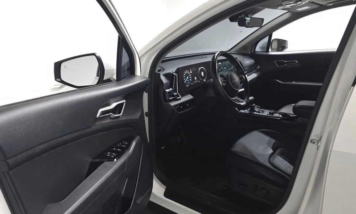 Kia Sportage — фото 9