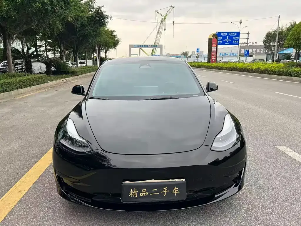 Tesla Model 3 — фото 7