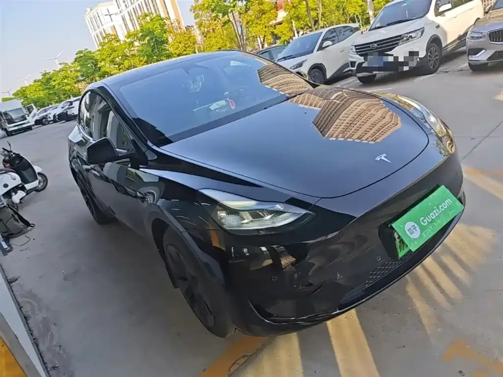 Tesla Model Y — фото 10